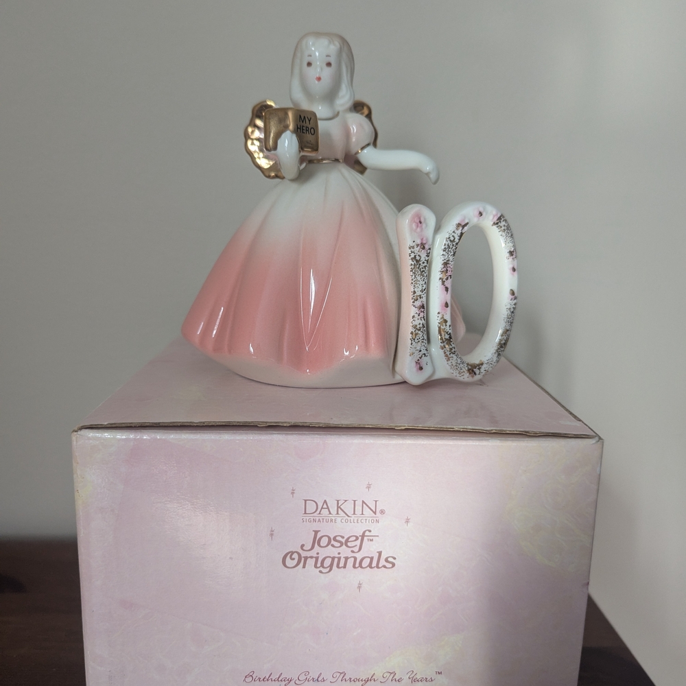 Charming Figurine with Gold Accents